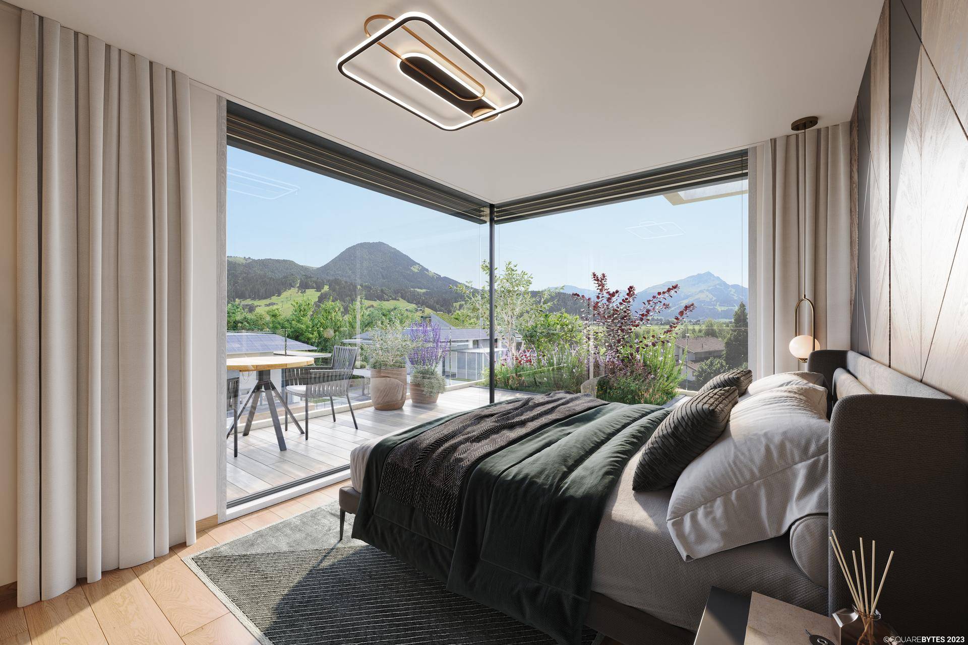 Helles Schlafzimmer mit bodentiefen Fenstern, Holzboden und einem weiten Blick auf die grüne Berglandschaft.