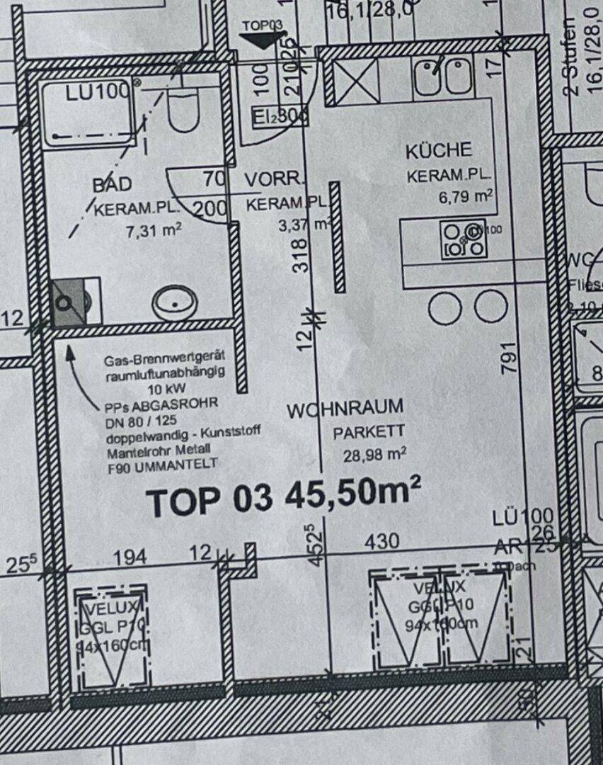 Detaillierter Grundriss einer Wohnung mit Küche, Wohnraum, Bad und Abstellfläche.