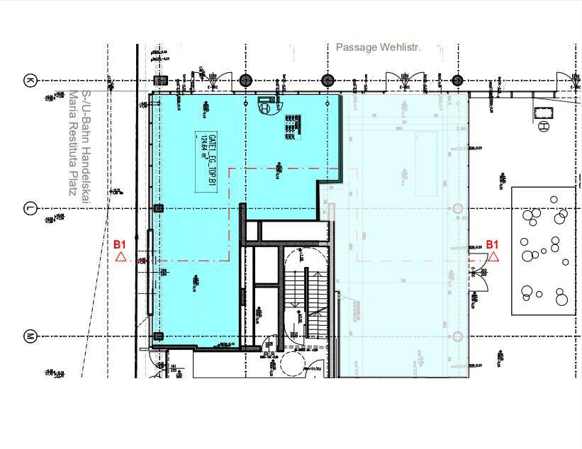 Grundrissplan einer Gewerbefläche im Erdgeschoss mit Treppenhaus und umliegender Infrastruktur.
