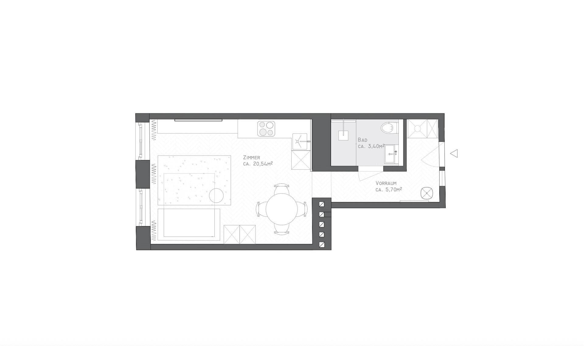 Grundriss einer kleinen Wohnung mit offenem Wohnbereich, integrierter Küche und separatem Bad.