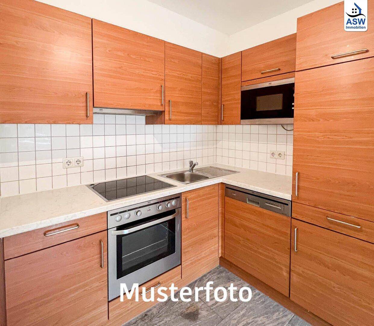 Schöne 3-Zimmerwohnung mit Terrasse in einem zentral gelegenen Wohnhaus (befristet vermietet) mit Potential - Ansicht 2