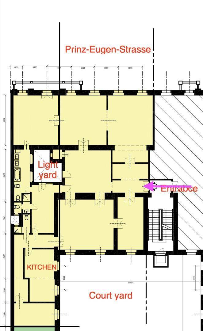 Grundrissplan einer Wohnung mit Küche und Zugang zum Innenhof.