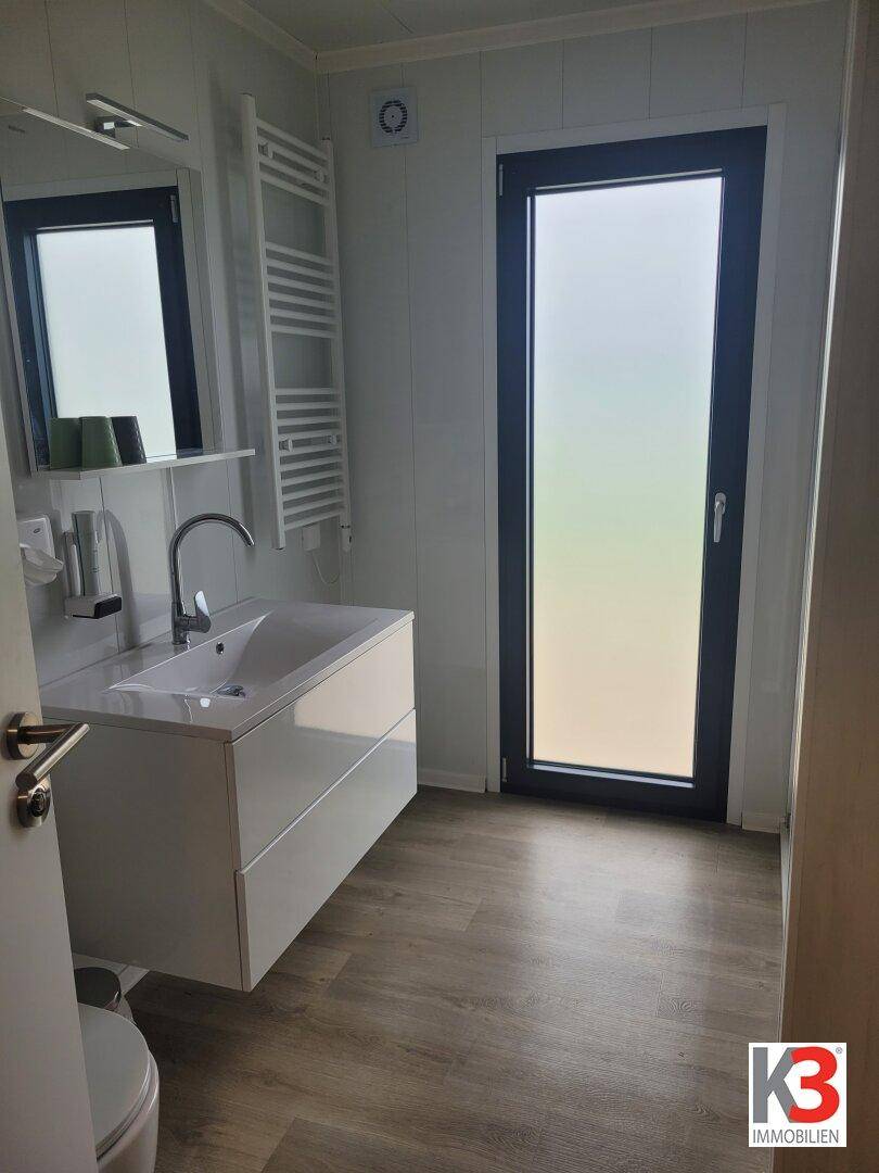 K3 - MODUL-HAUS DER EXTRAKLASSE. Wohnfläche 68 m², 2 Schlafzimmer, 40 m² Terasse. Ganzjahresnutzung möglich. Ferienregion Klopeinersee. - Ansicht 6