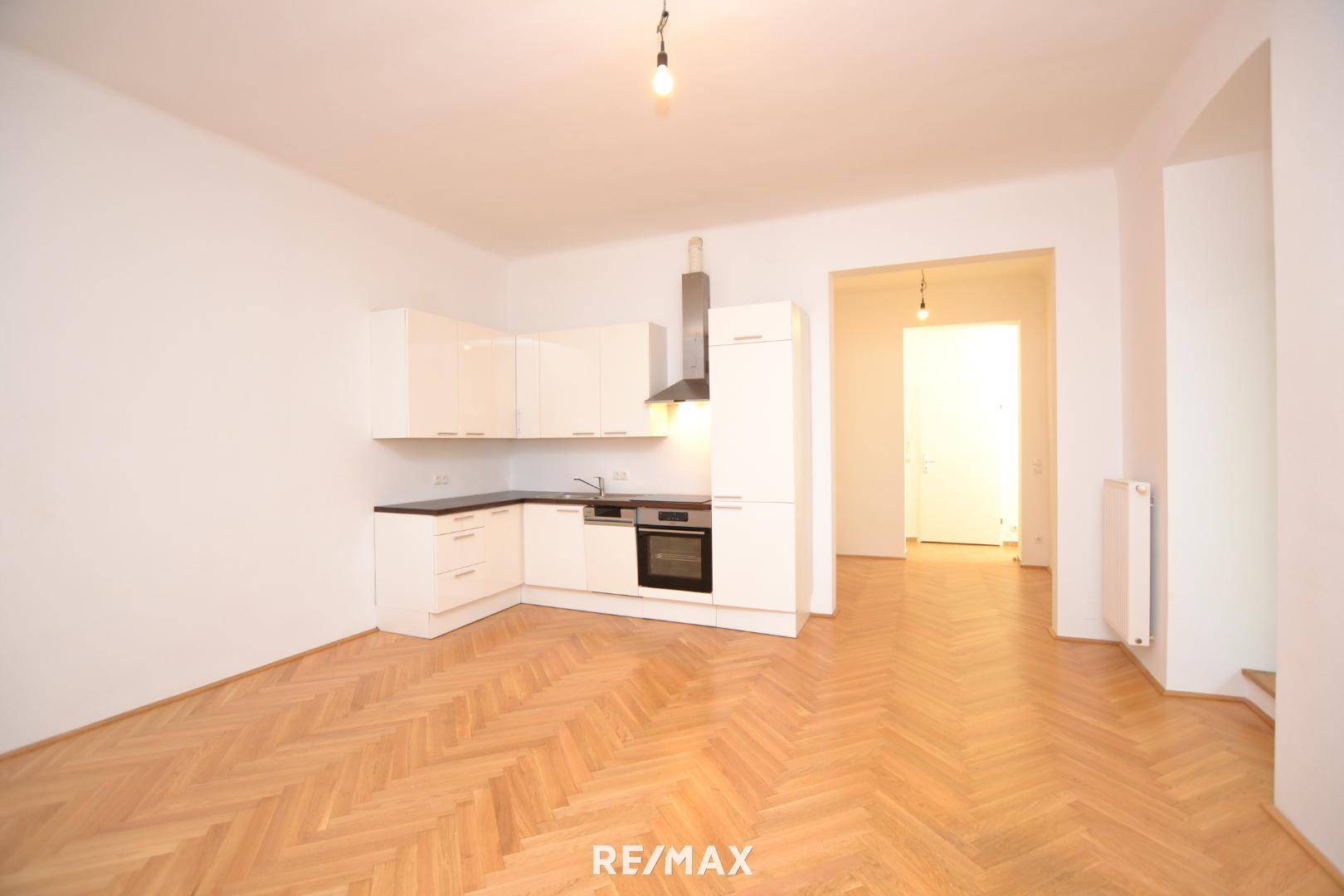 Wohnzimmer mit Küche
