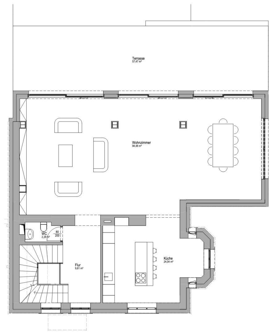 Grundriss mit großem Wohnzimmer, Küche mit Kochinsel, separatem WC und einer Terrasse.