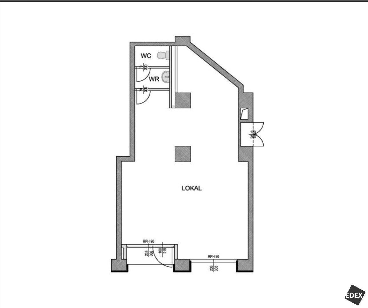 Grundriss eines Gewerberaums mit separatem WC-Bereich und großzügiger offener Fläche.