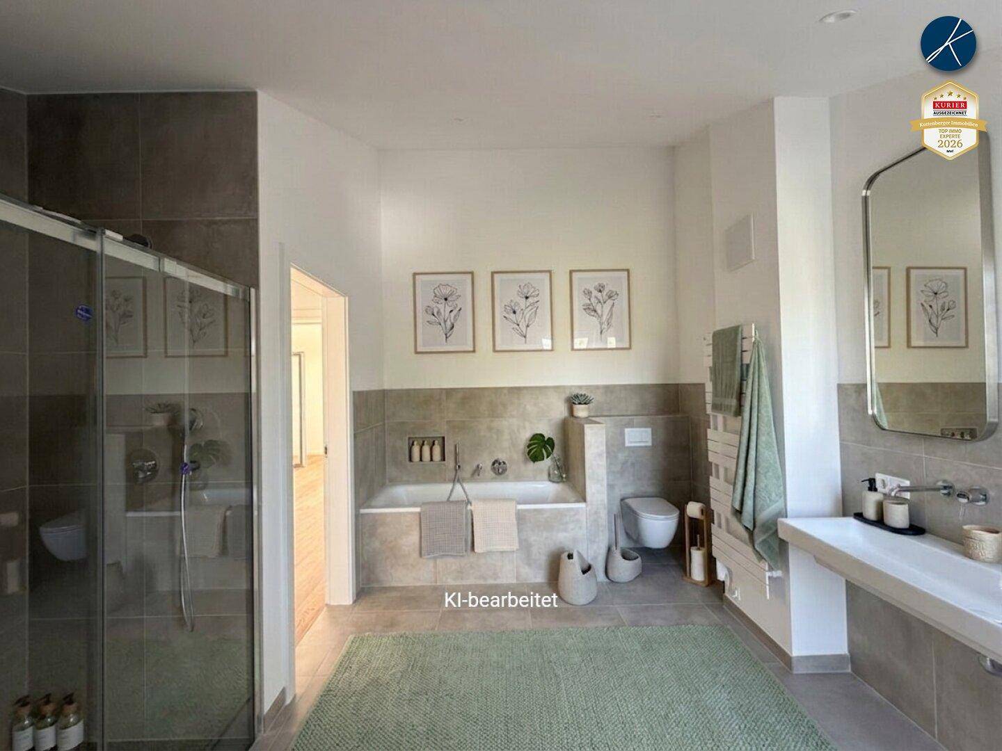 Modernes Badezimmer mit Badewanne, Dusche, Doppelwaschbecken und grauen Fliesen.