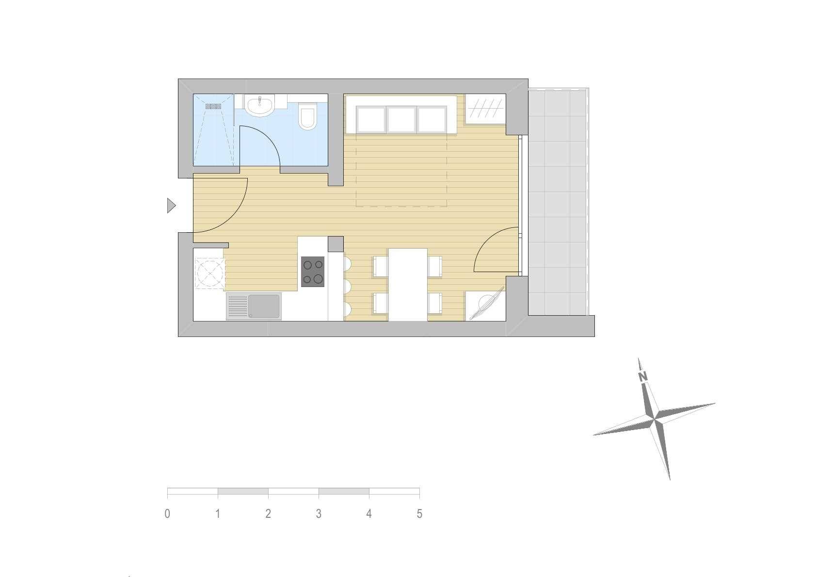 Grundriss einer Wohnung mit offener Küche, Essbereich und einem Badezimmer.