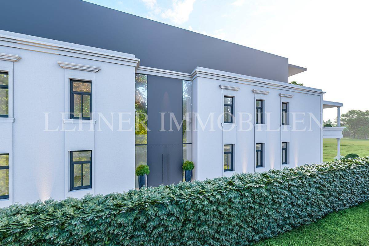 Detailansicht des modernen Eingangs einer Villa mit großen Fenstern und gepflegter Hecke.