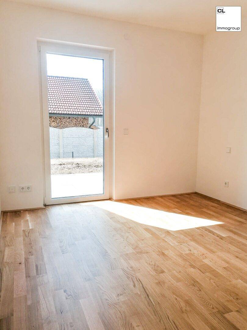 Schlafzimmer mit Zugang zur Terrasse