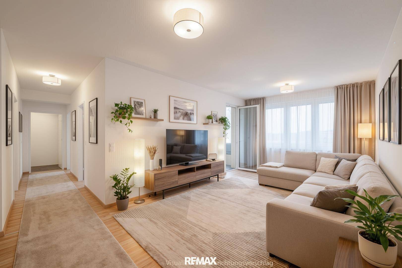 Helles, modern eingerichtetes Wohnzimmer mit großem Sofa und Blick in den Flur.