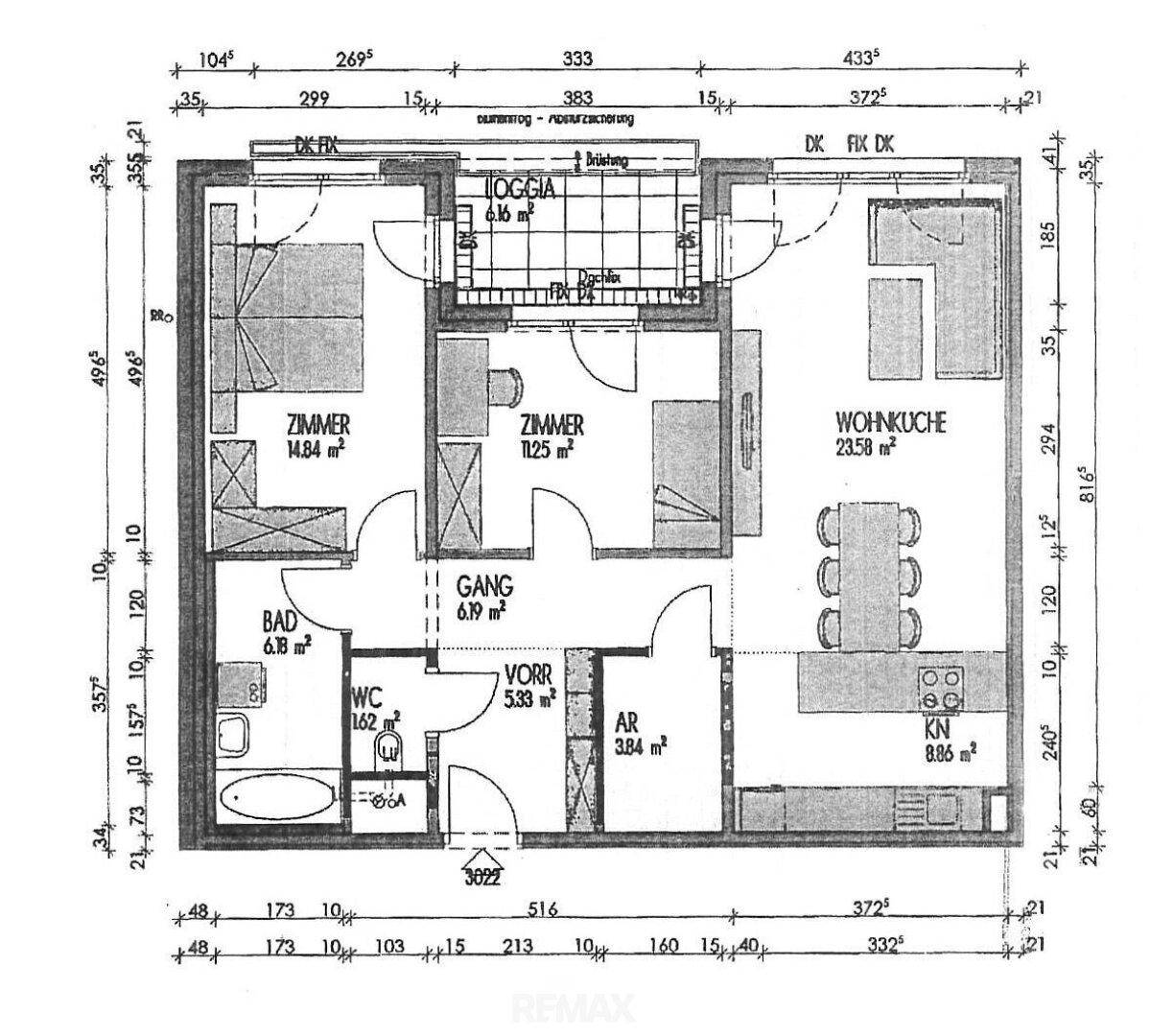 Schwarz-weißer Grundriss einer Wohnung mit Loggia, Wohnküche und separatem WC.