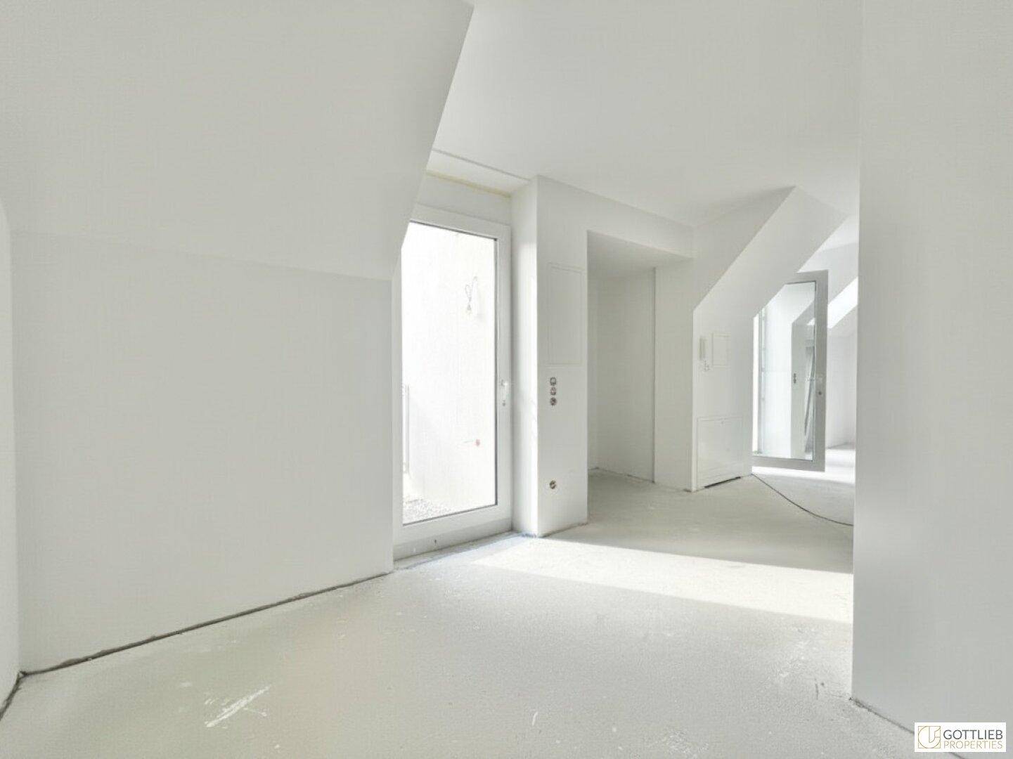 Geräumiger Flur mit viel Tageslicht und Zugang zu verschiedenen Bereichen der Wohnung.