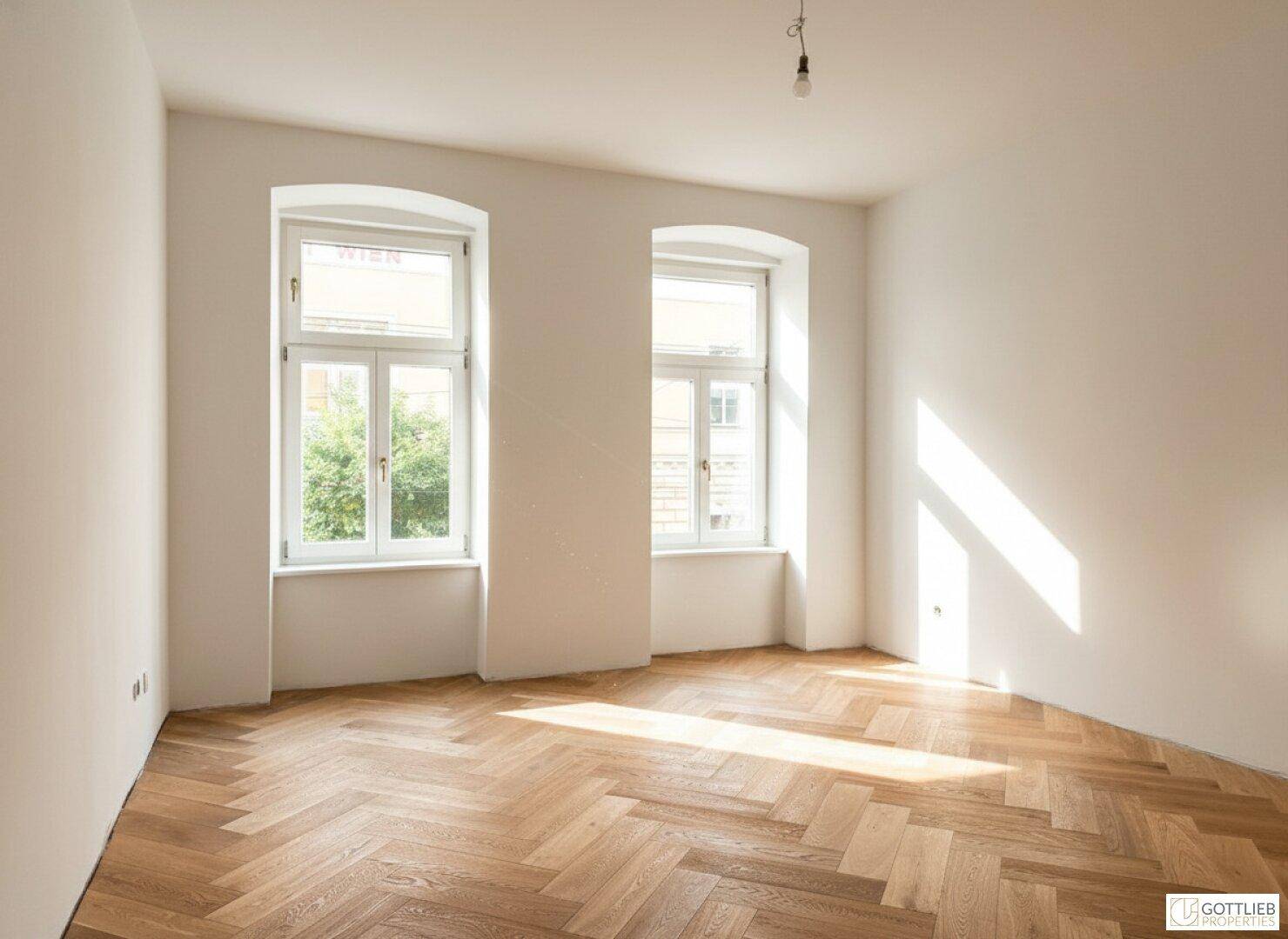 Lichtdurchfluteter Raum mit Fischgrätparkett und hohen Fenstern, ideal für Wohn- oder Schlafzimmer.