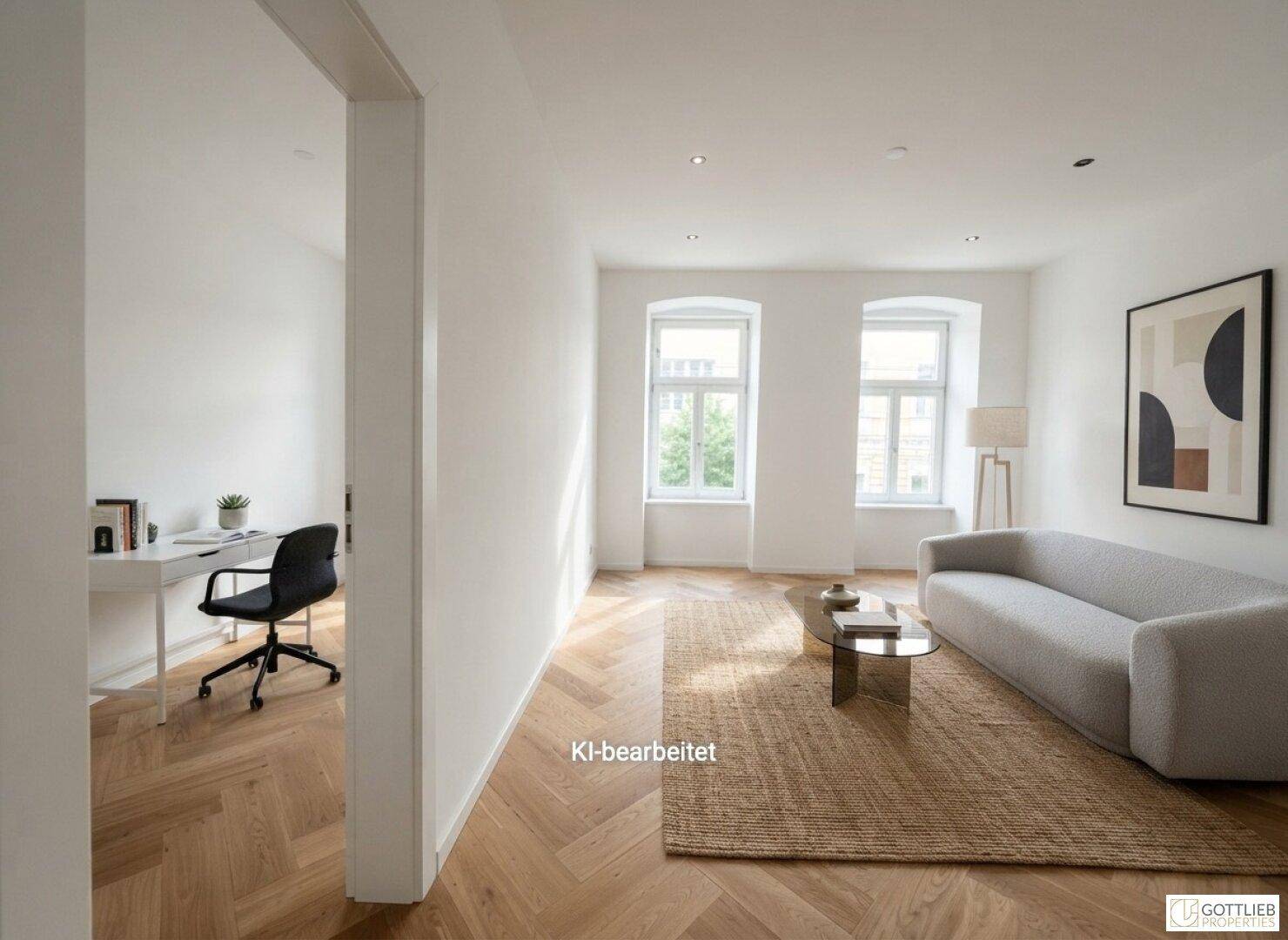 Geräumiges Wohnzimmer mit hellem Sofa, modernem Teppich und Zugang zu einem Arbeitsbereich.