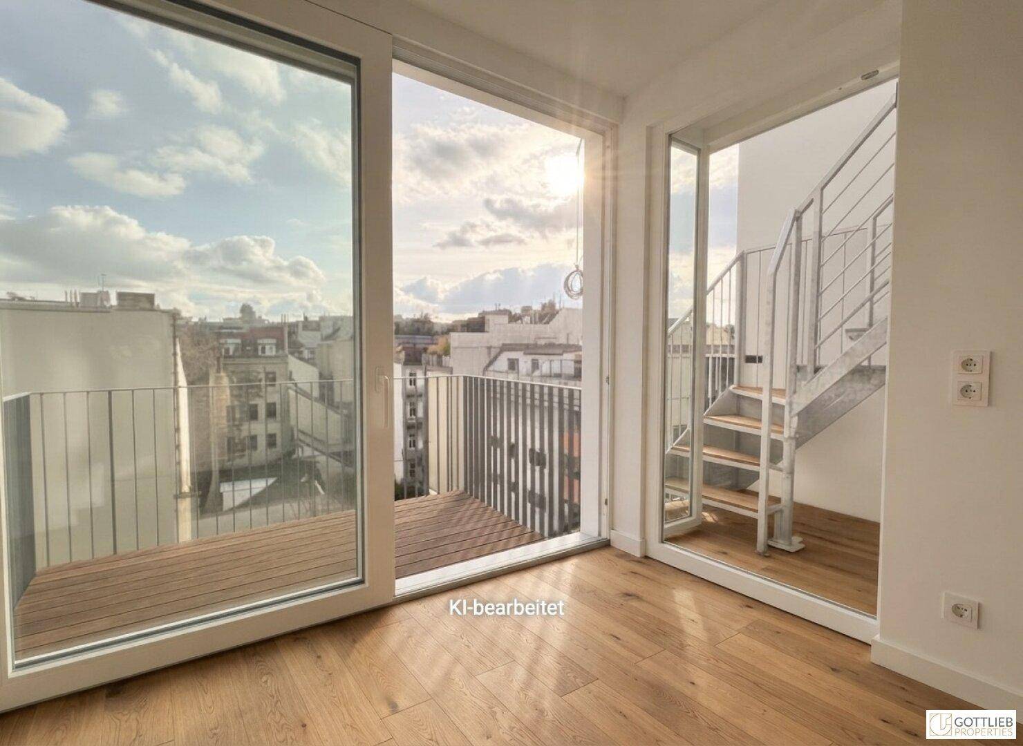 Heller Übergangsbereich mit Zugang zu einem Außenbereich und einer modernen Treppe.