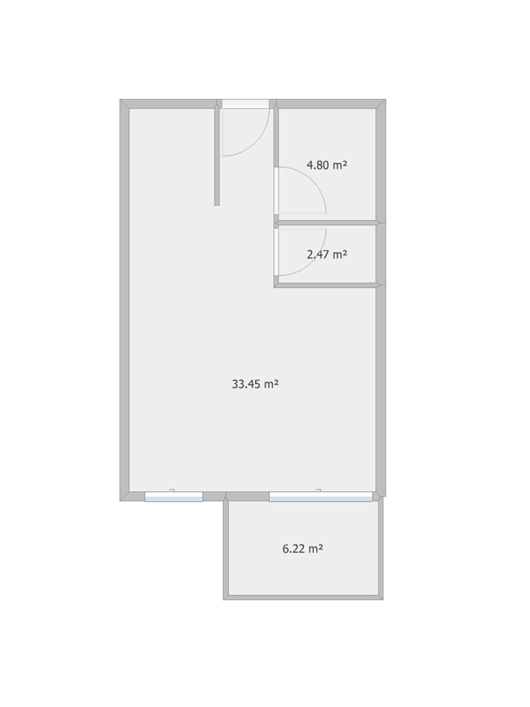 Detaillierter Grundriss einer kleinen Wohnung mit Balkon und separaten Bereichen.