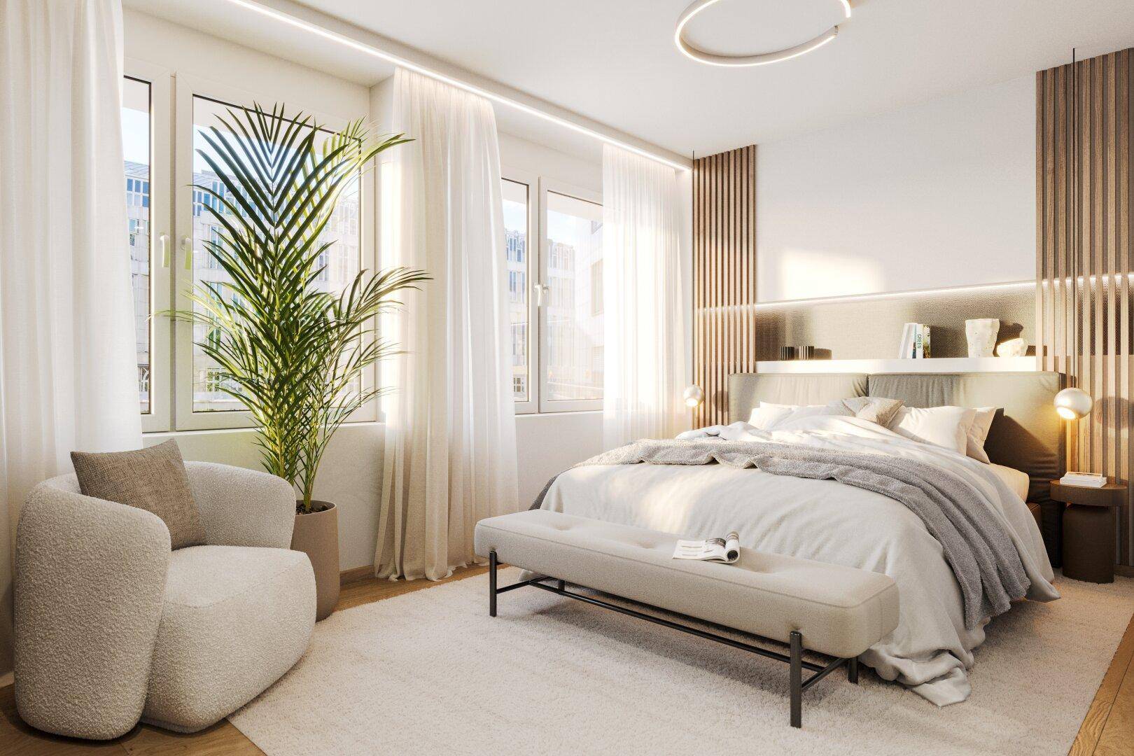 Helles Schlafzimmer mit großem Bett, bequemen Sessel und bodentiefen Fenstern für viel Licht.