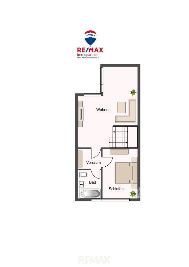 Grundriss des Obergeschosses mit Schlafzimmer, Badezimmer und Wohnbereich.