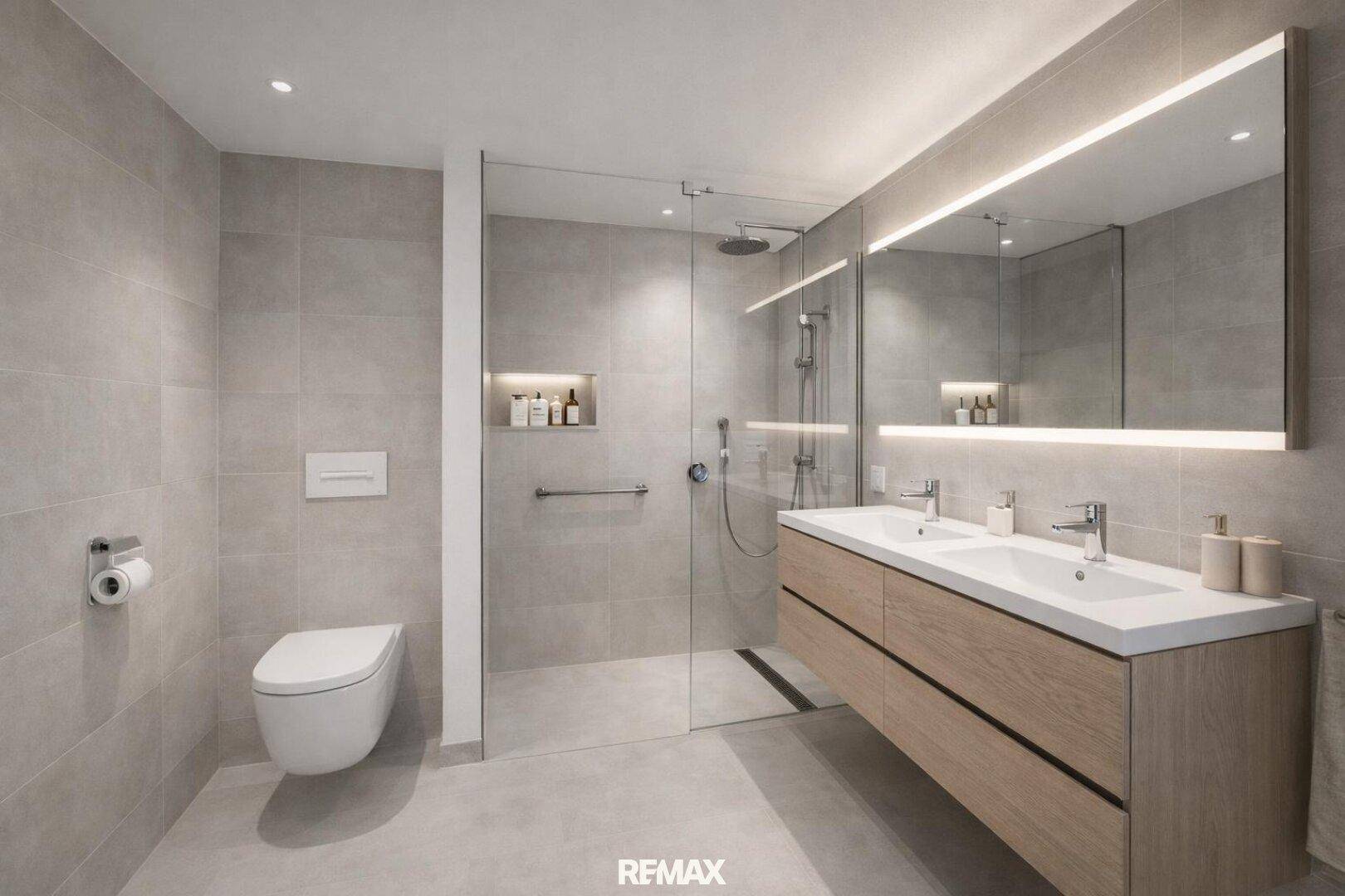 Modernes Badezimmer mit Doppelwaschbecken, großer begehbarer Dusche und Wand-WC.