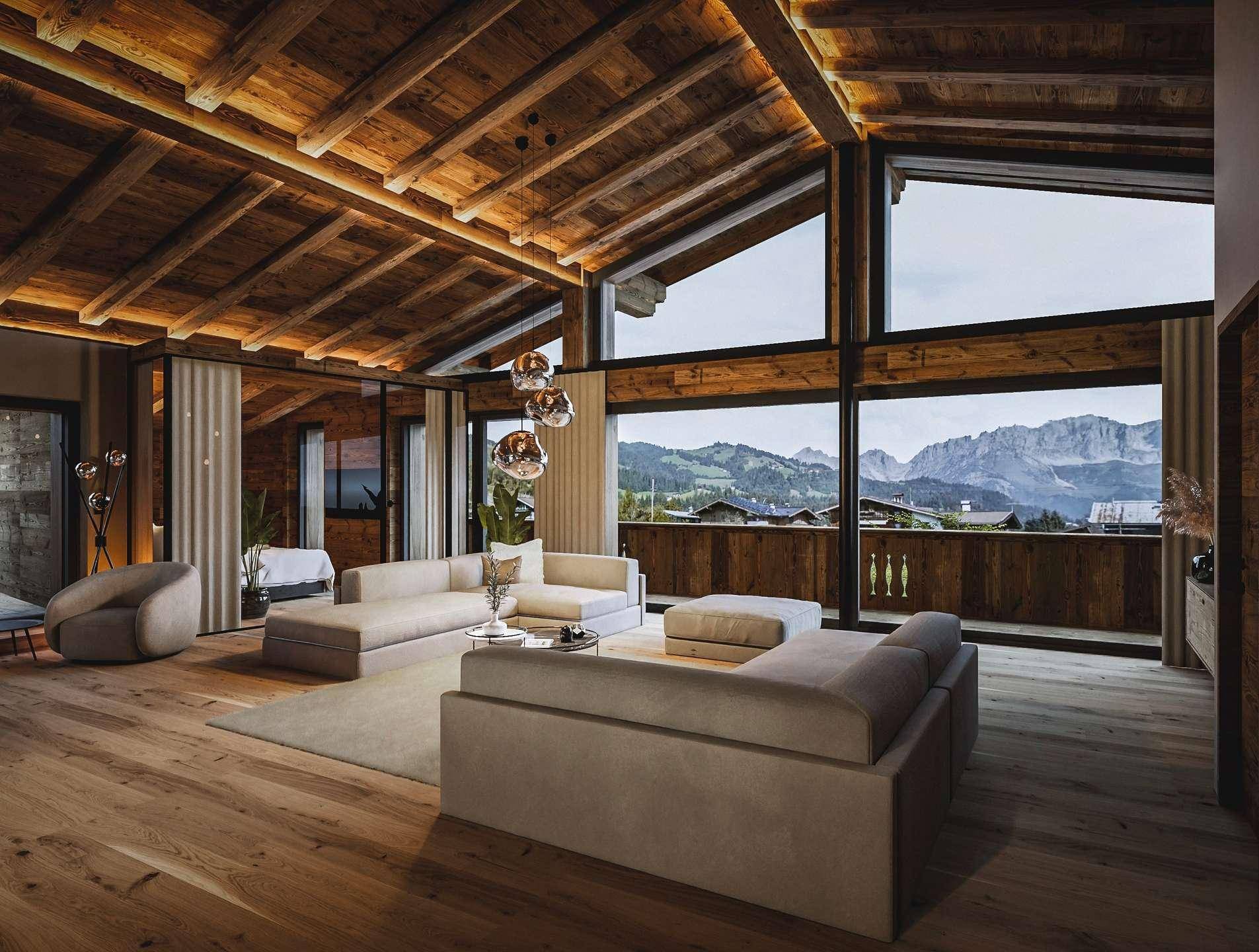Geräumiges Wohnzimmer mit hohen Holzdecken, großen Fenstern und atemberaubendem Bergblick.
