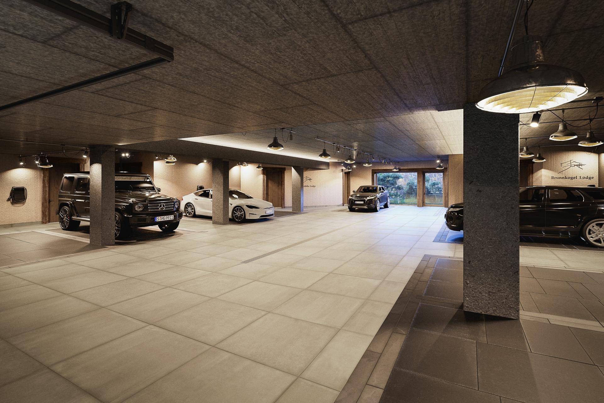 Geräumige Tiefgarage mit mehreren Stellplätzen und moderner Beleuchtung.