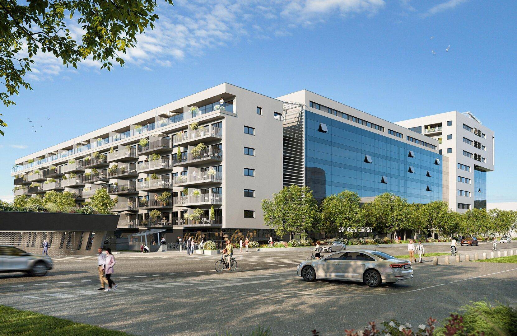 Moderne Architektur eines Wohn- und Geschäftshauses mit Glasfassade an einer städtischen Straße.