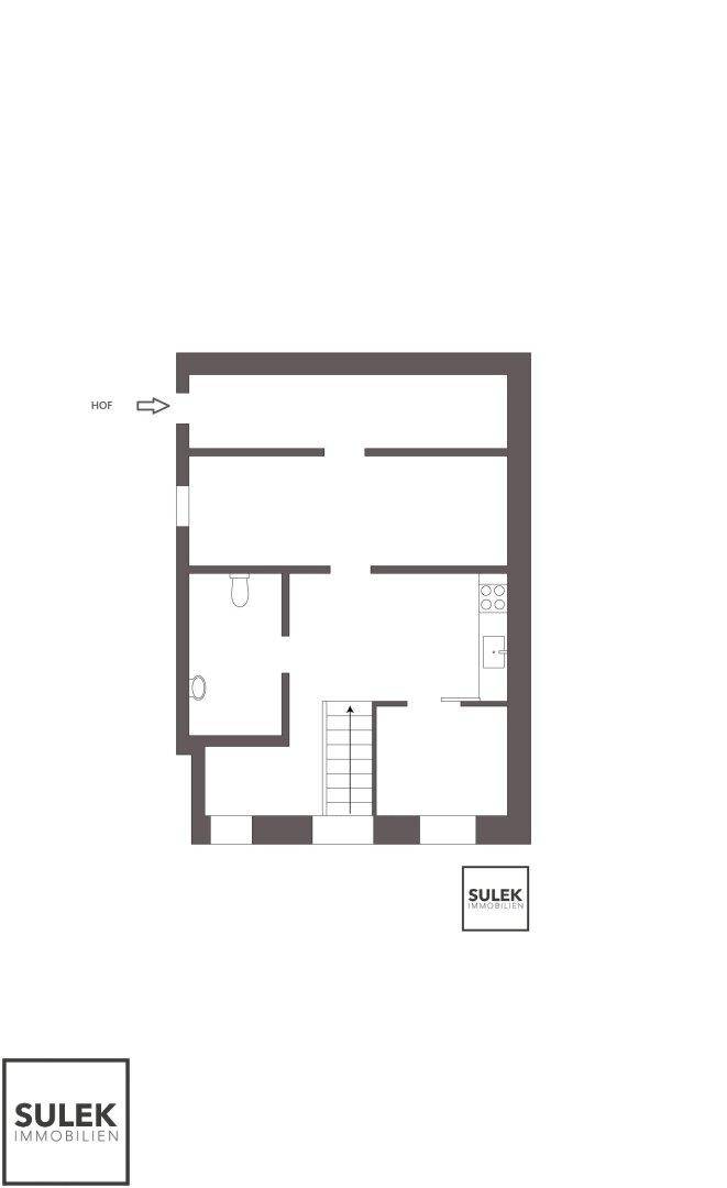Grundriss des Obergeschosses mit Treppe, Bad und einem Raum mit Küchenzeile.