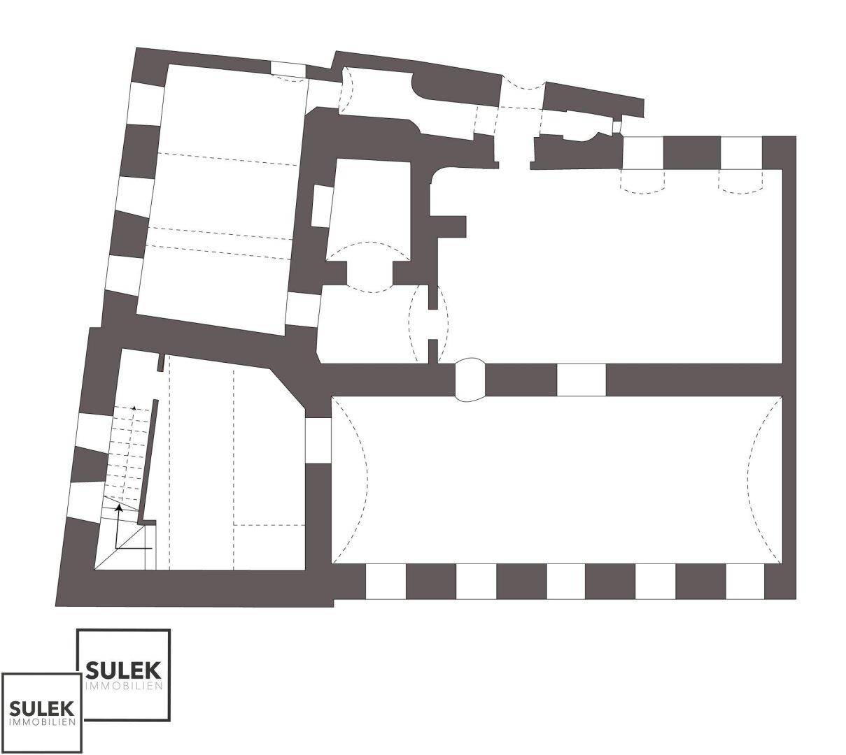 Grundriss des Untergeschosses mit großen Räumen und einem Treppenhaus.