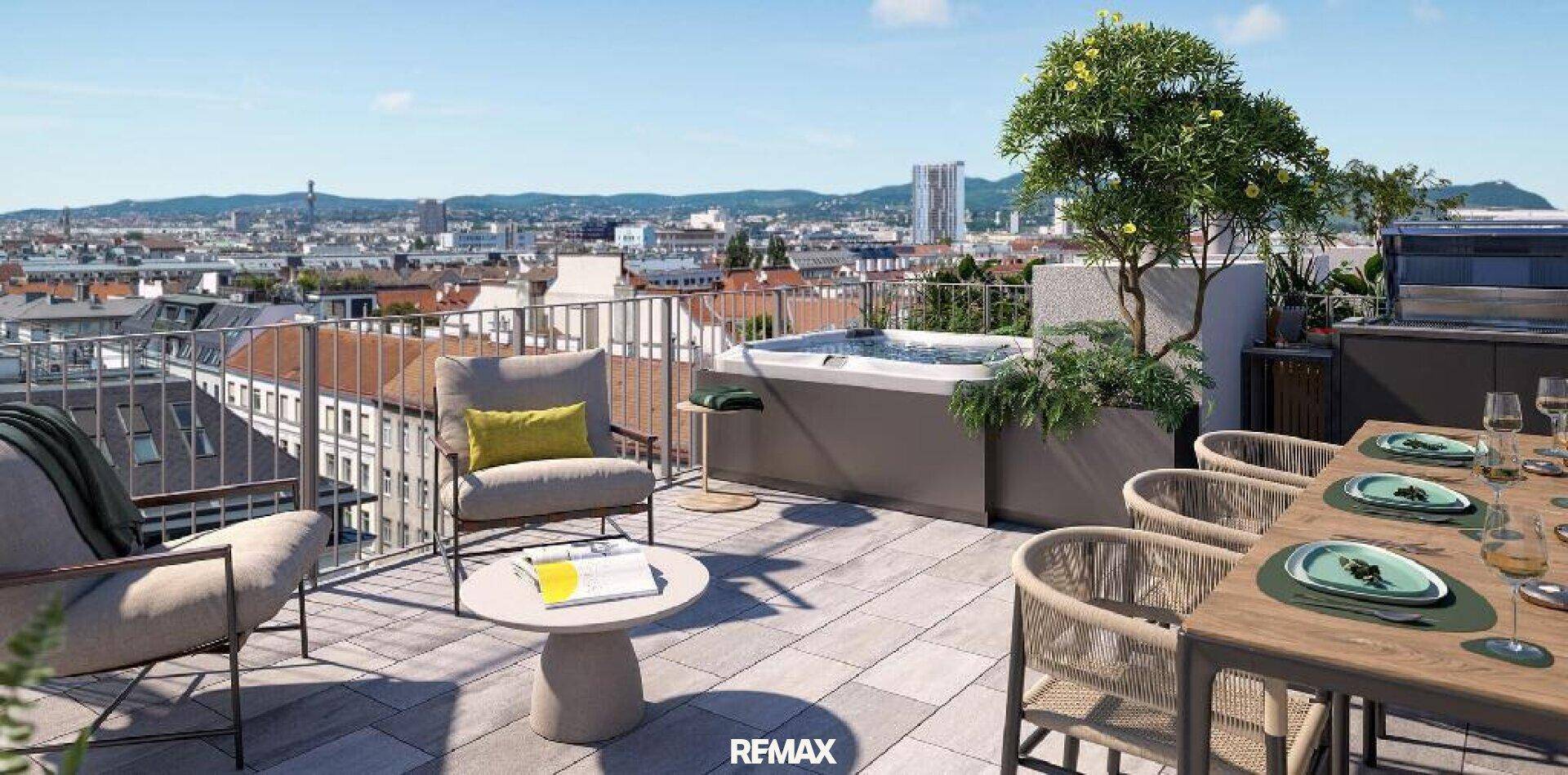 Exklusive Dachterrasse mit Whirlpool, Essbereich und Panoramablick über die Stadt.