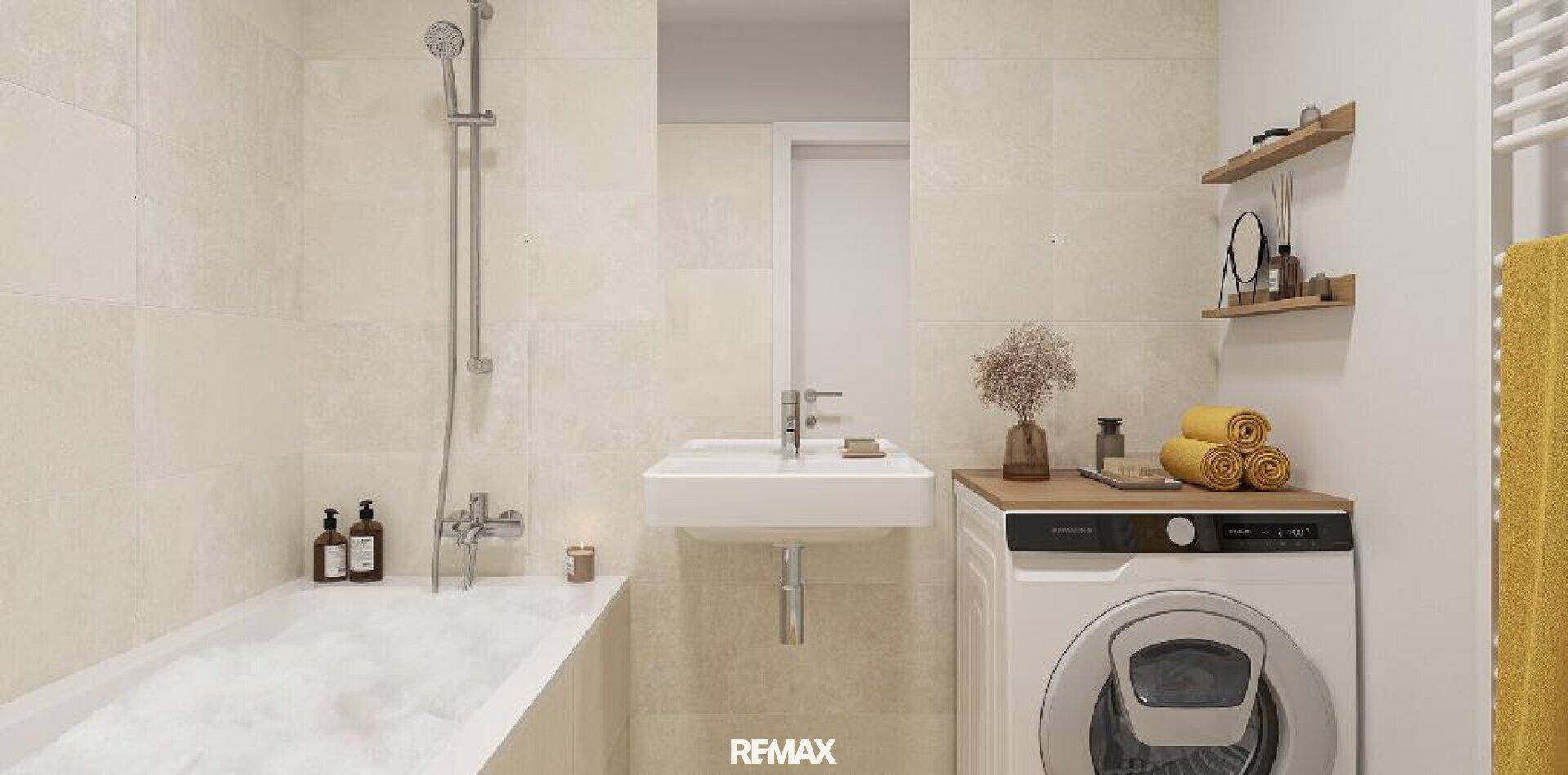 Helles Badezimmer mit Badewanne, Einzelwaschbecken und integrierter Waschmaschine.