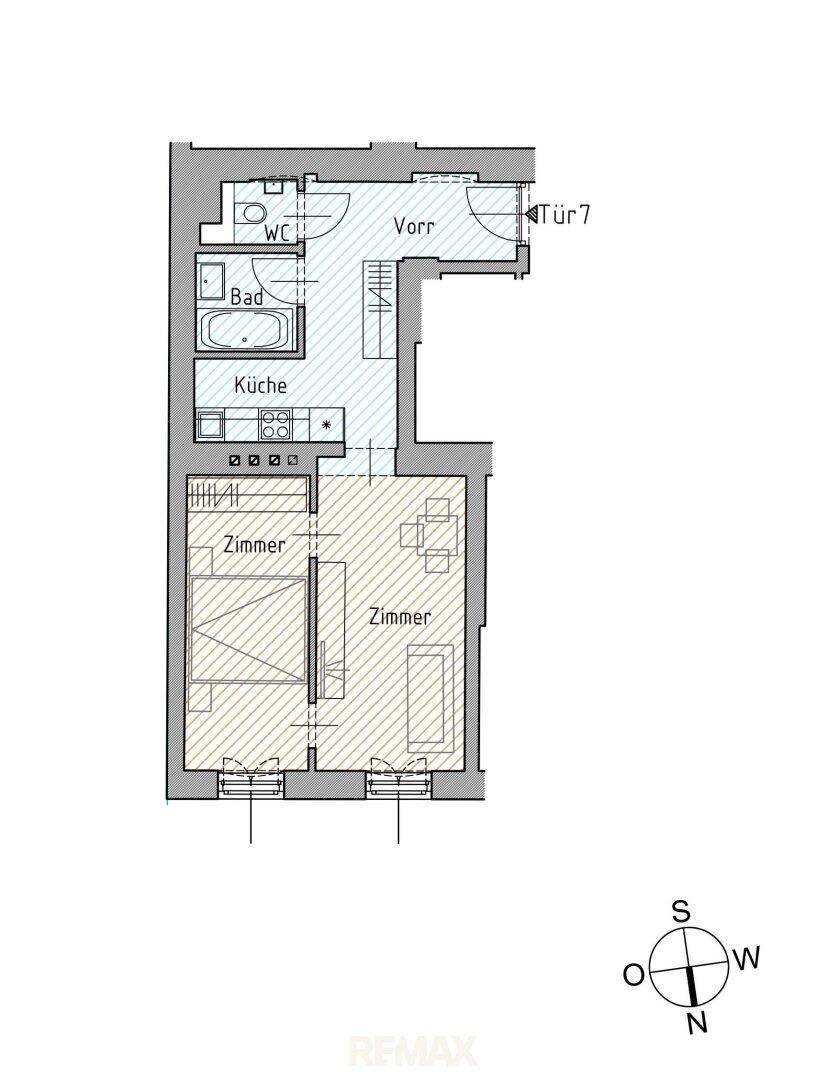 Grundriss einer Wohnung mit Küche, Bad, separatem WC und zwei Zimmern.