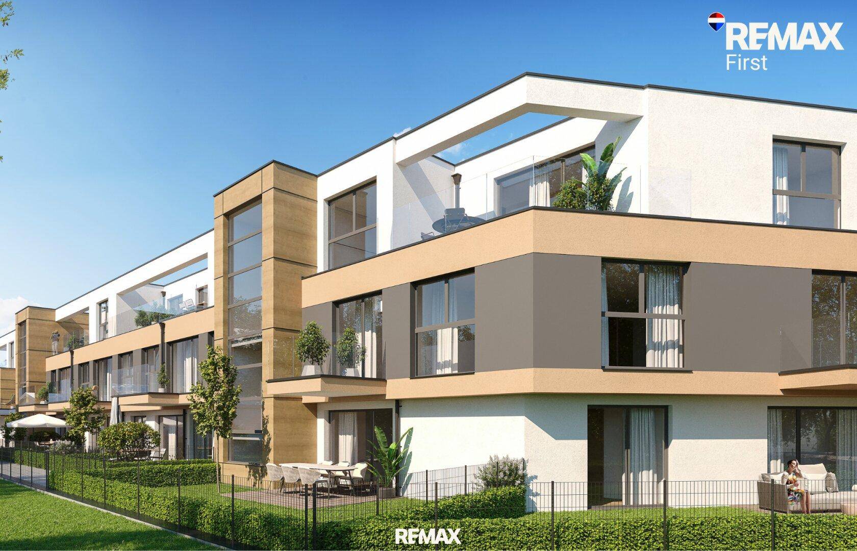 Ansicht der modernen Wohnanlage mit Terrassen und begrünten Außenbereichen.