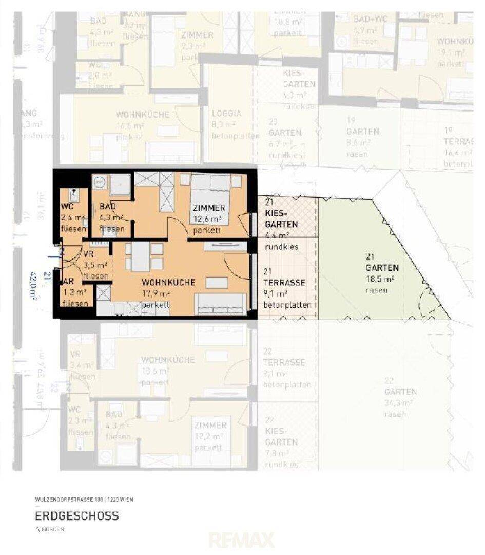 Grundriss einer Erdgeschosswohnung mit Wohnküche, Schlafzimmer, Bad und Terrasse.