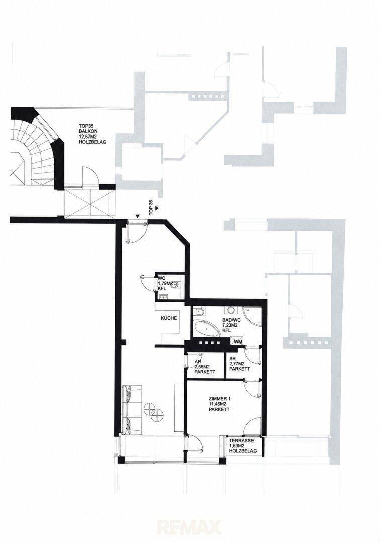 Grundrissplan einer Wohnung mit Küche, Bad, WC, Zimmer und Terrasse.