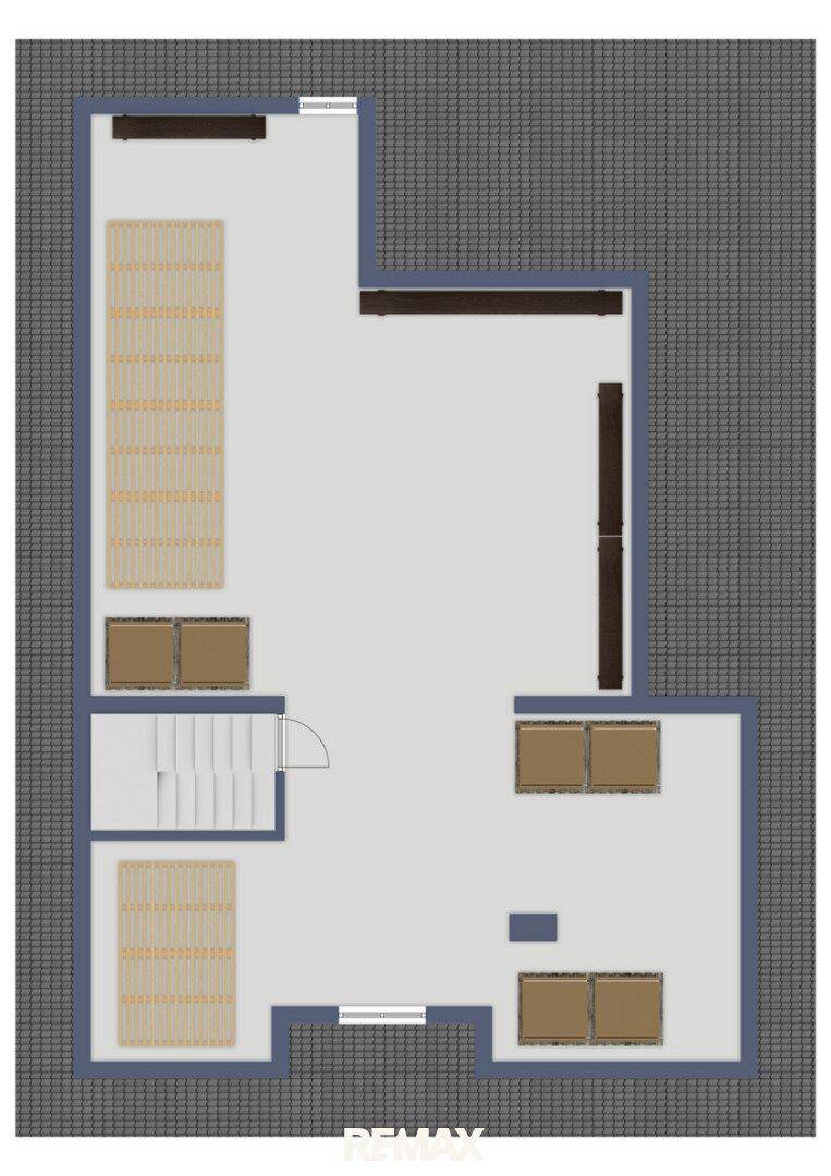 Grundriss des Obergeschosses mit Schlafzimmern und Dachschrägen, inklusive Treppenaufgang.