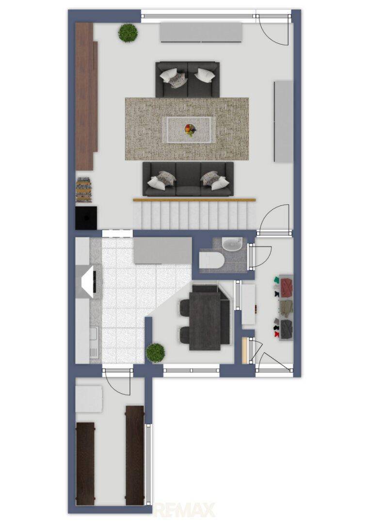 Detaillierter Grundriss des Erdgeschosses mit Küche, Essbereich und Wohnzimmer.
