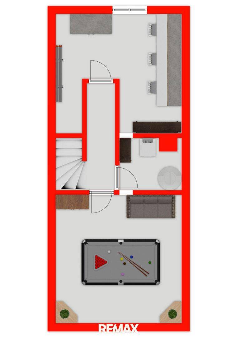 Grundrissplan zeigt einen Raum mit Billardtisch und Treppenaufgang, ideal für Freizeitaktivitäten.