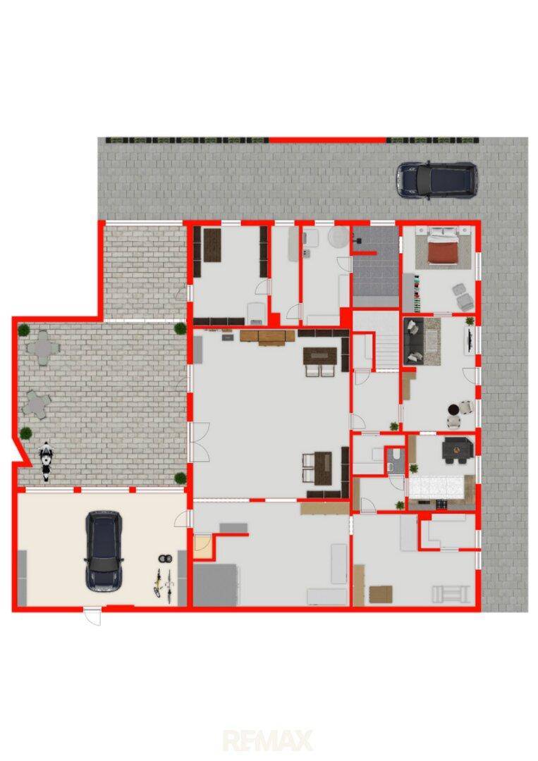 Grundriss des Erdgeschosses mit integrierter Garage, Terrasse und offenem Wohnbereich.