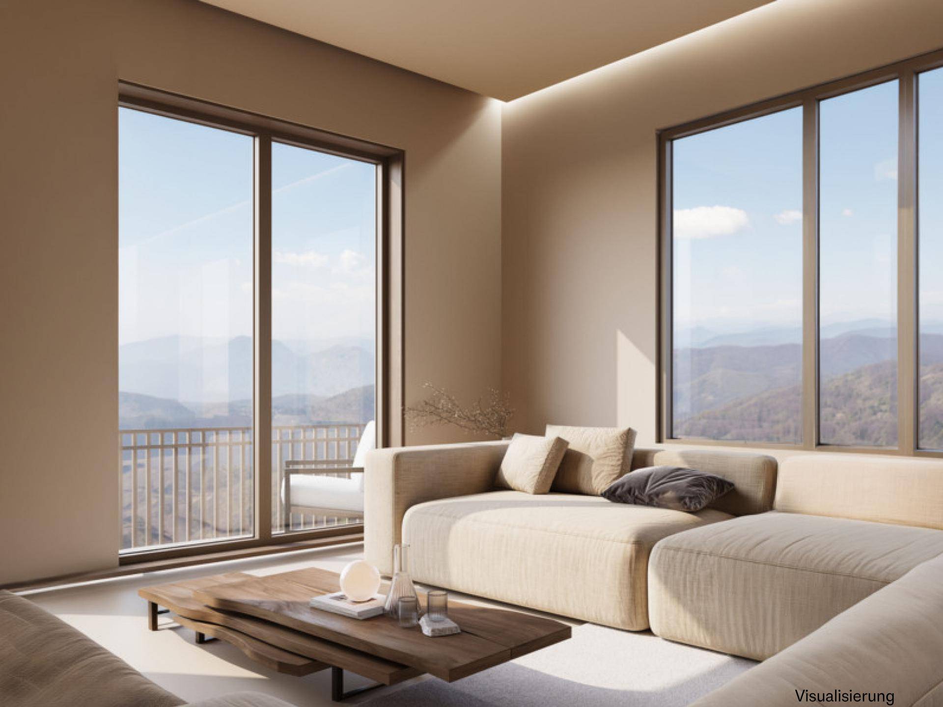 Gemütliches Wohnzimmer mit beigefarbenem Sofa, Holztisch und weitem Blick in die Natur.
