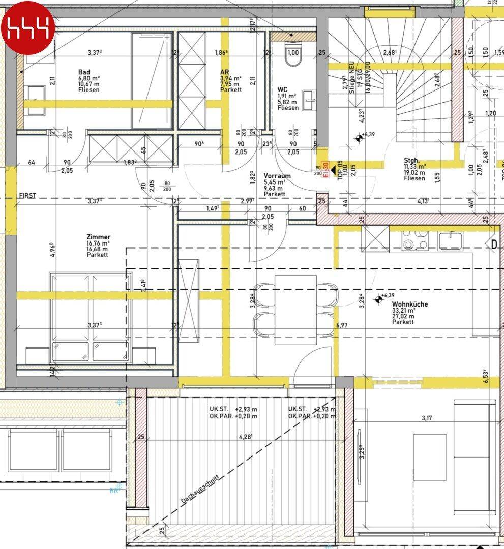 Detaillierter Grundriss einer Wohnung mit offener Wohnküche, Bad, separatem WC und Terrasse.