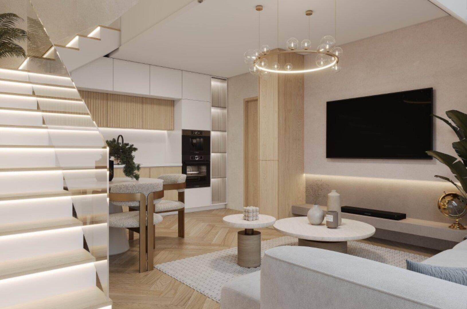 Offener Wohnbereich mit integrierter Küche, moderner Treppe und Wandfernseher.