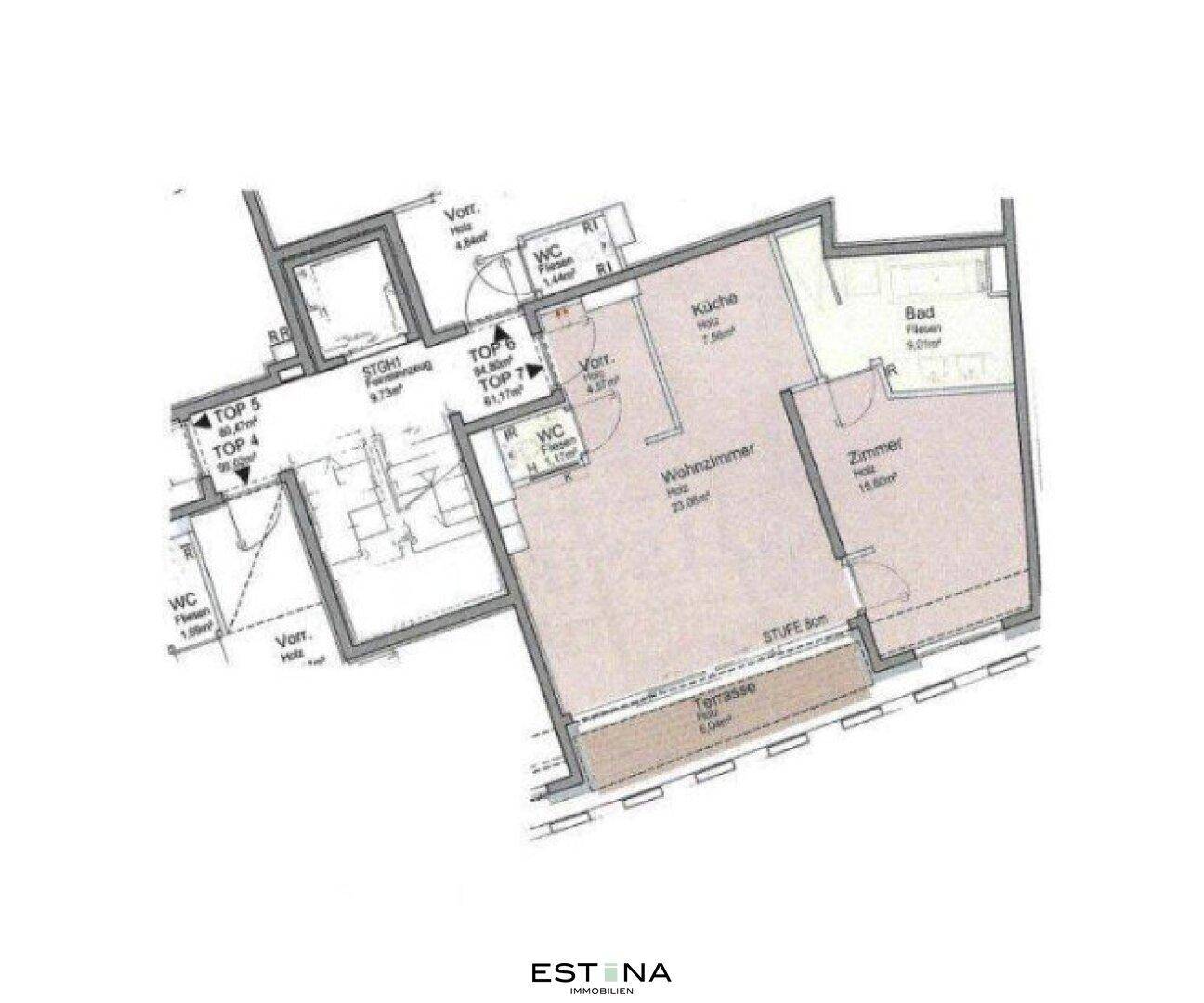Grundriss einer Wohnung mit Wohnzimmer, Küche, Bad, separaten WCs und einer Terrasse.