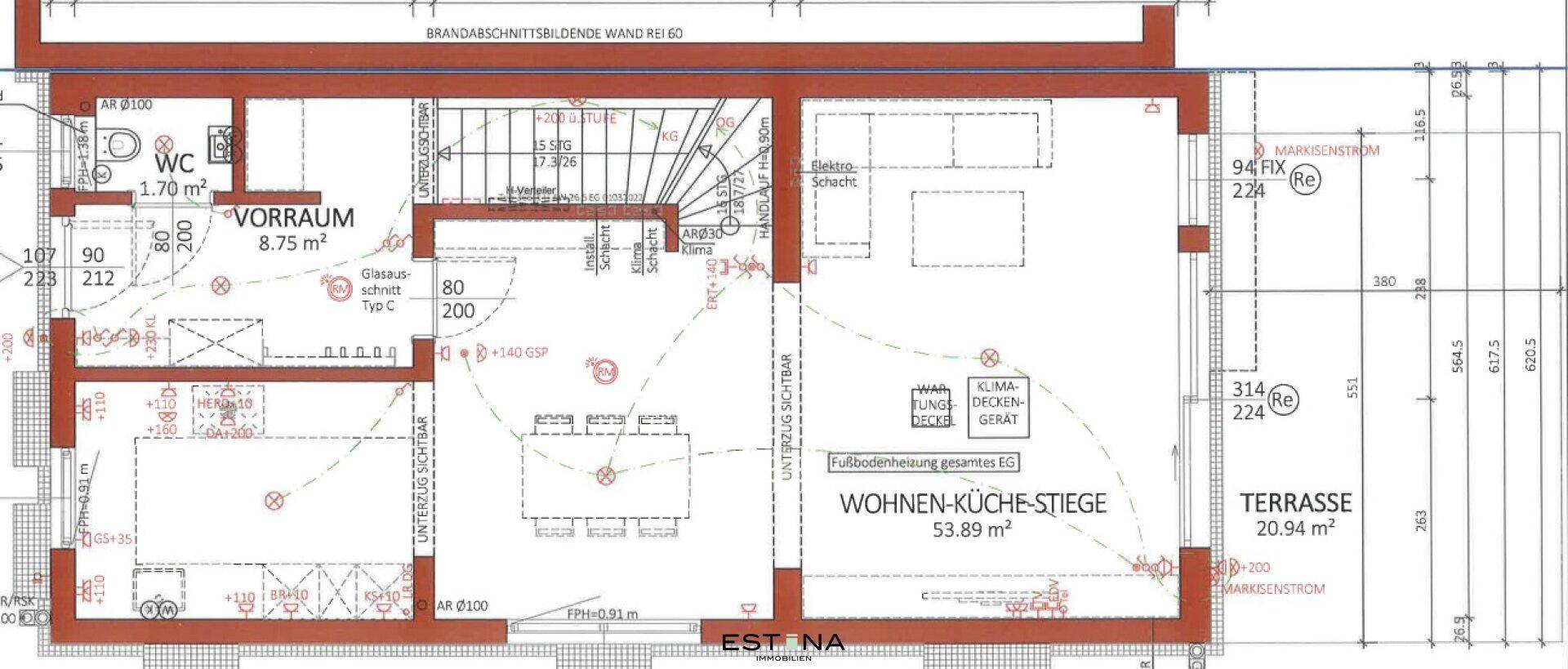 Grundriss des Erdgeschosses mit offenem Wohn-Küchenbereich, WC und Terrasse.