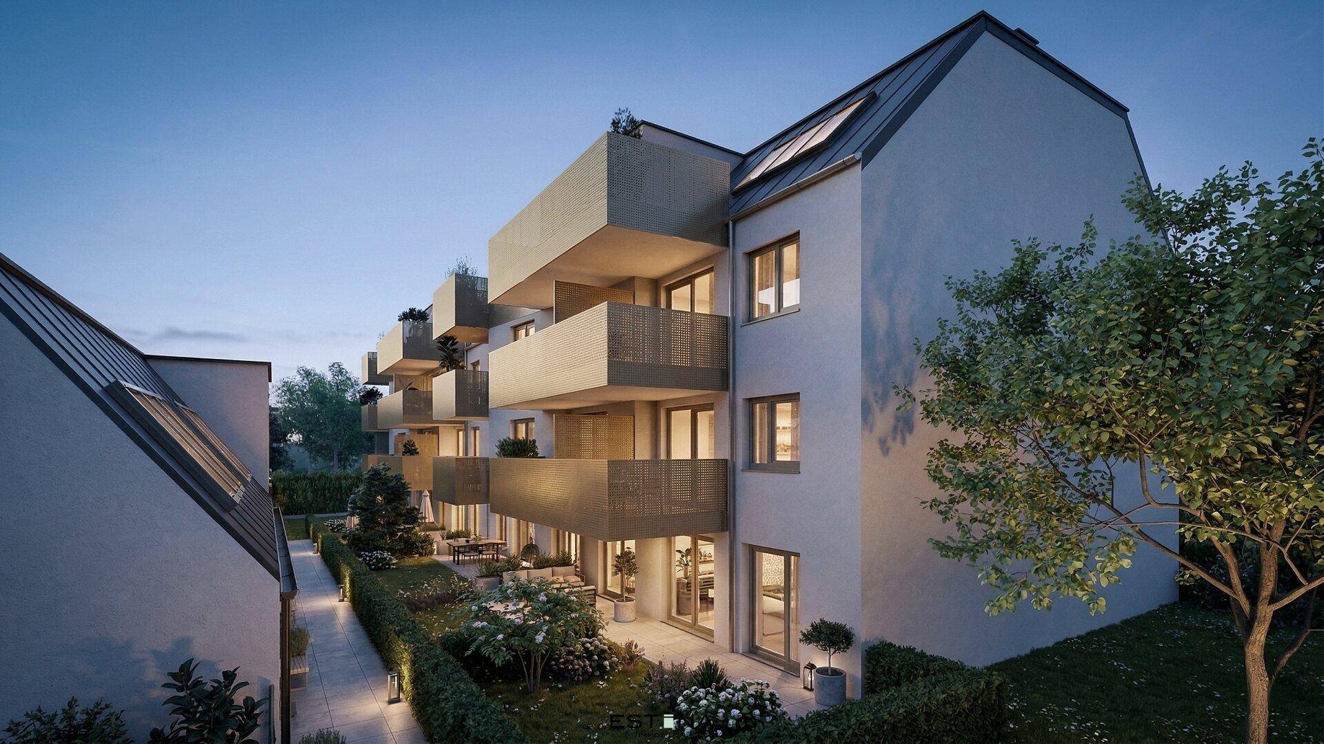 Modernes Mehrfamilienhaus mit Balkonen und Terrassen in einer ruhigen Wohngegend.