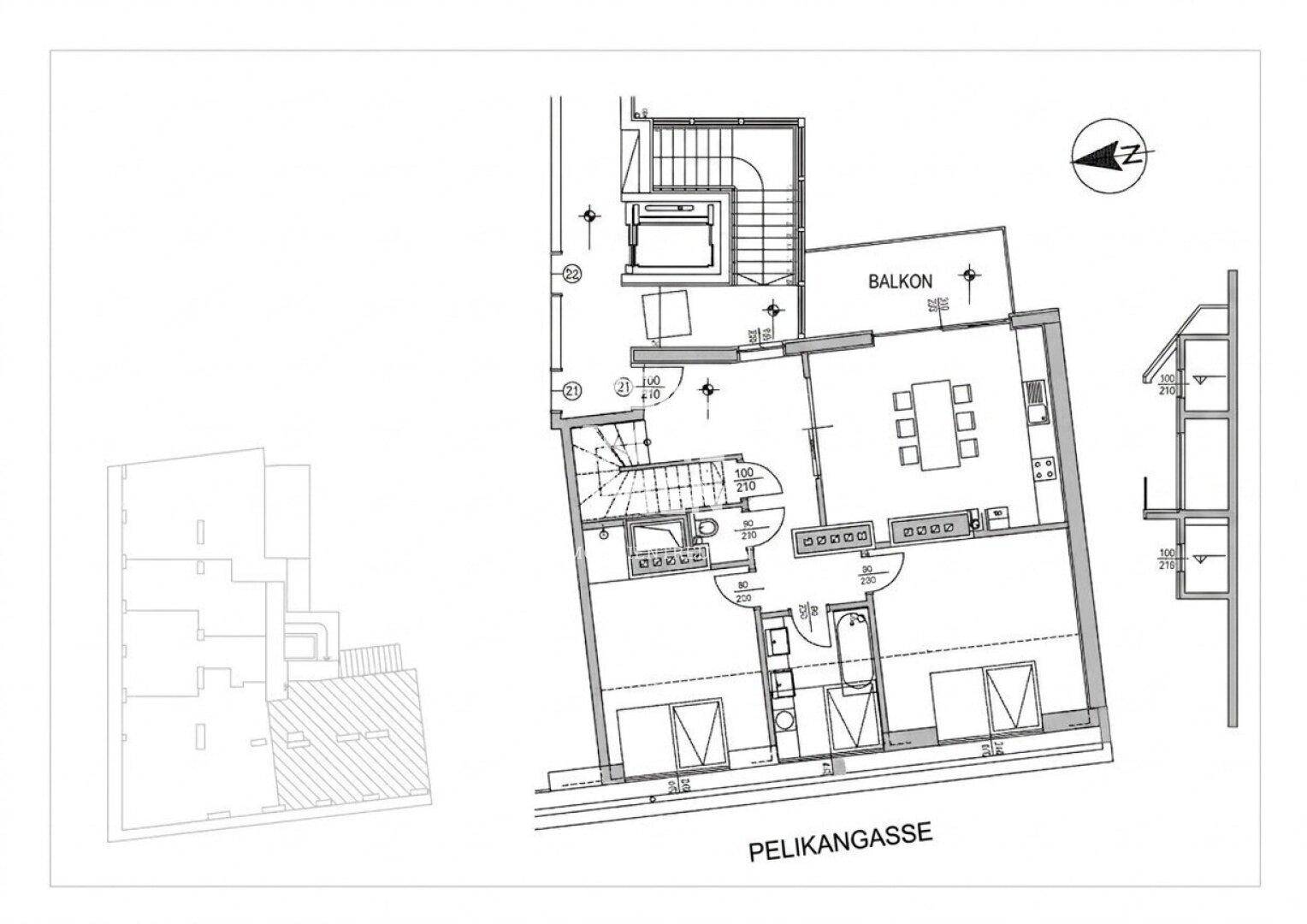 Grundriss einer Wohnung mit offenem Wohnbereich, Balkon und Aufzugszugang.