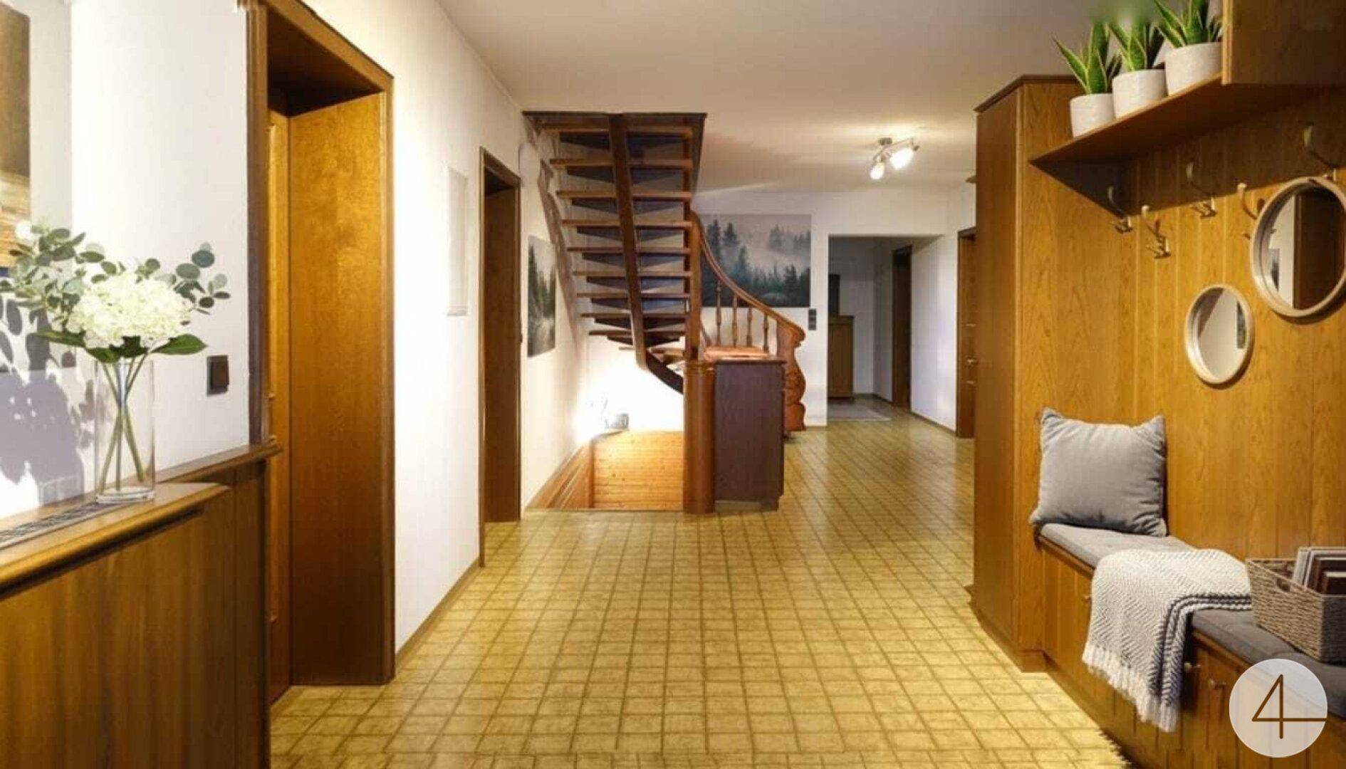 Geräumiger Flur mit Holzvertäfelung, gefliestem Boden und einer geschwungenen Holztreppe.