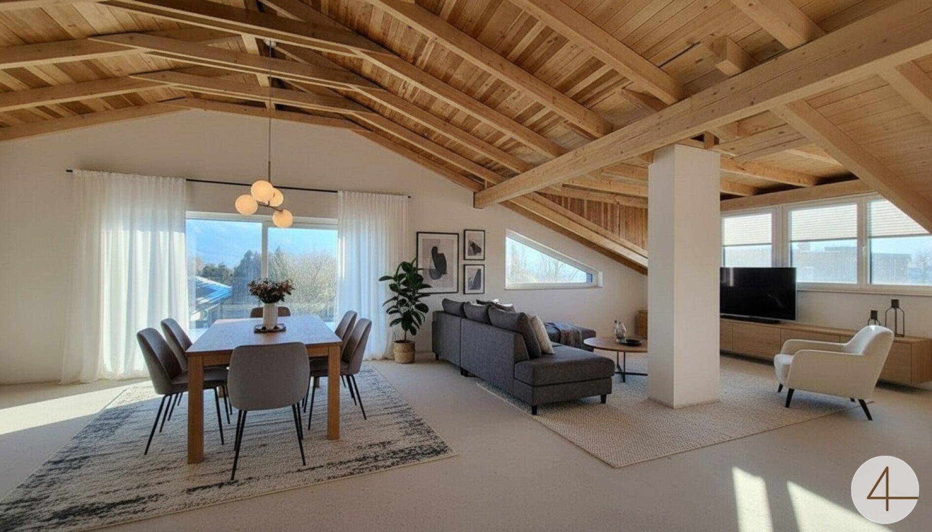 Heller Wohn-Essbereich mit freiliegenden Holzbalken, großen Fenstern und modernem Mobiliar.