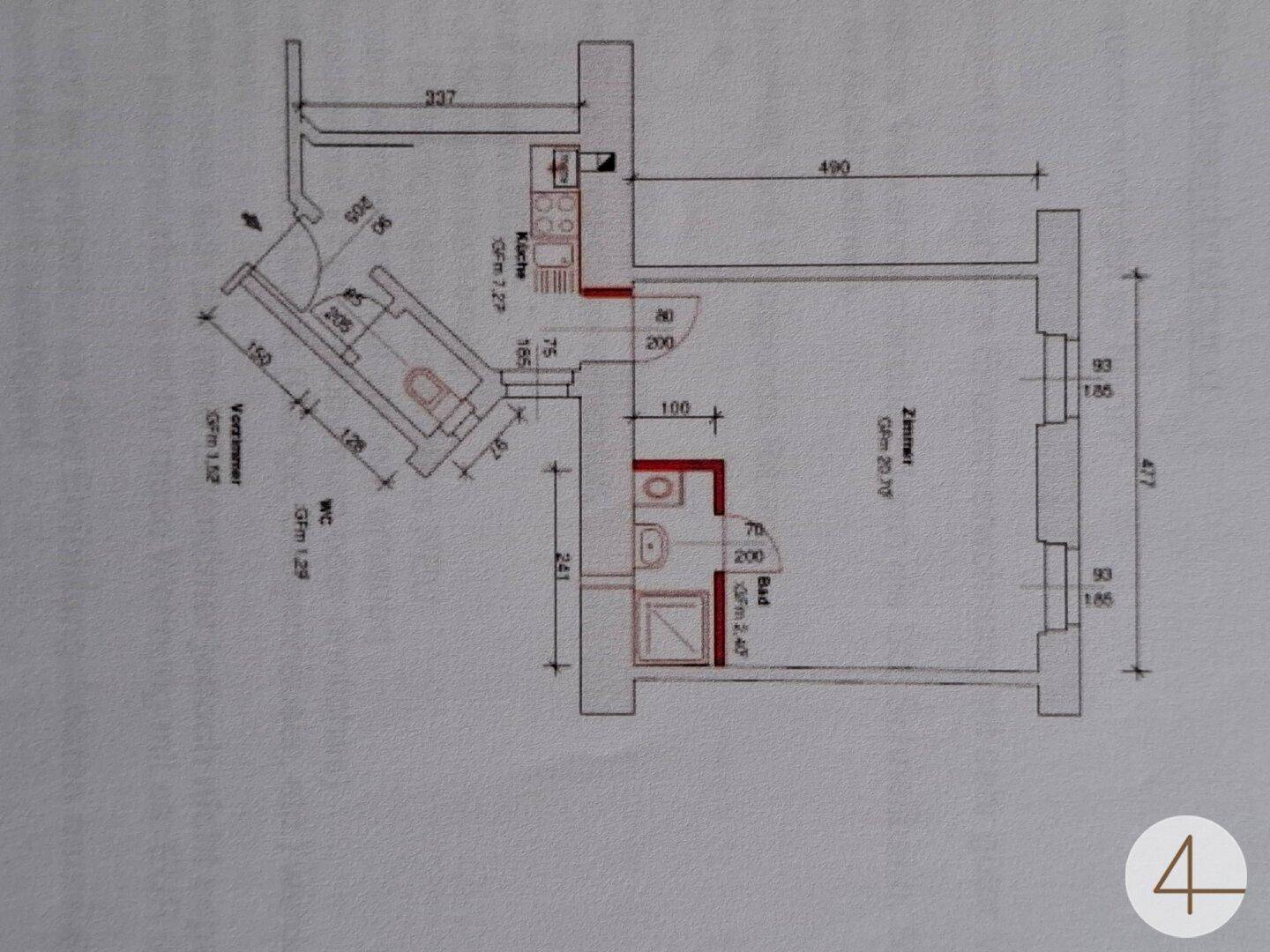 Grundrissplan einer kleinen Wohnung mit Küche, separatem WC und einem Zimmer.