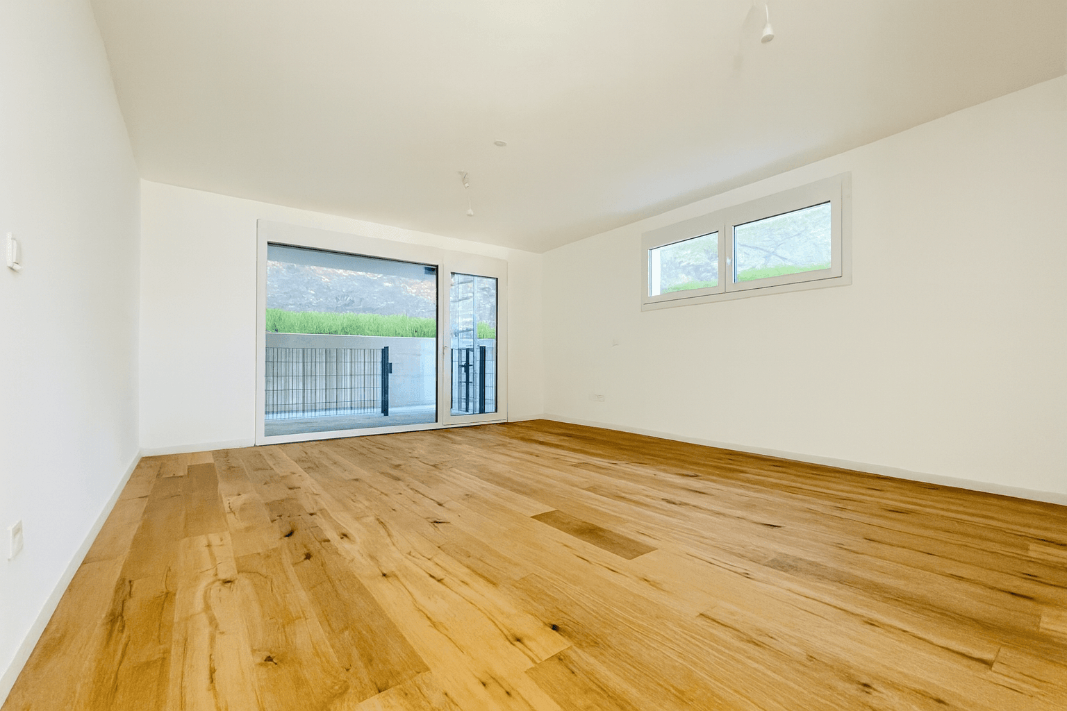 Wohnzimmer mit Zugang kleine Terrasse